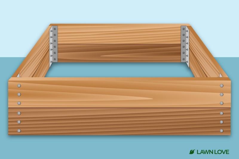 An illustration of a wooden garden bed with four metal corner brackets.