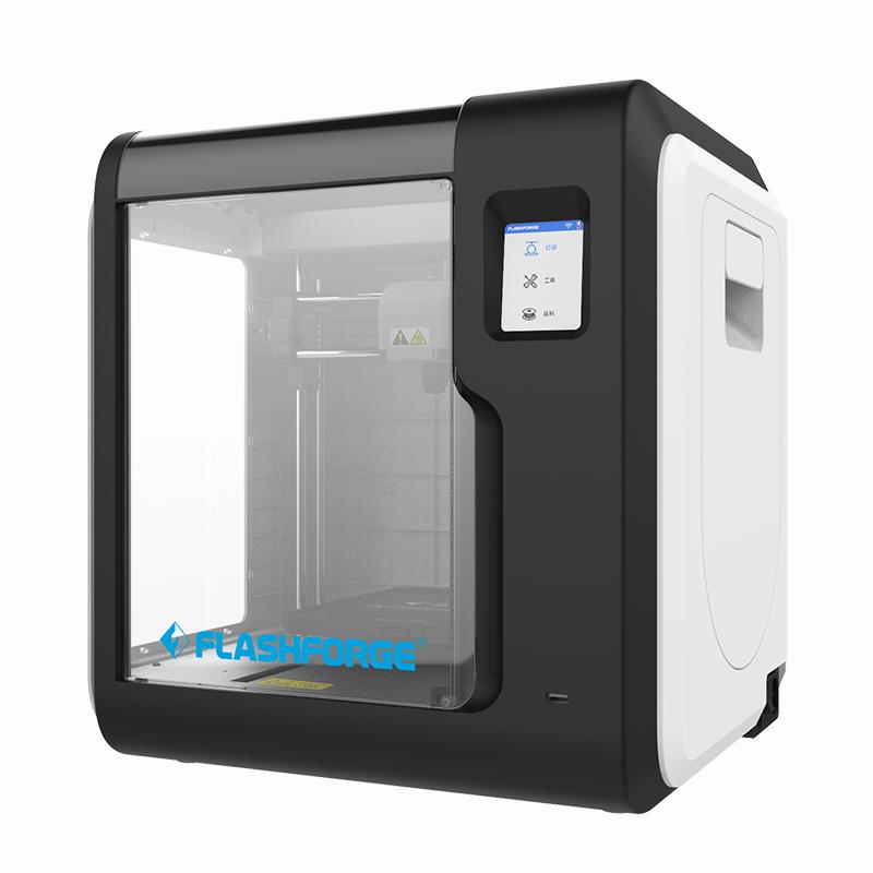 The image shows a black and white 3D printer with a blue screen.