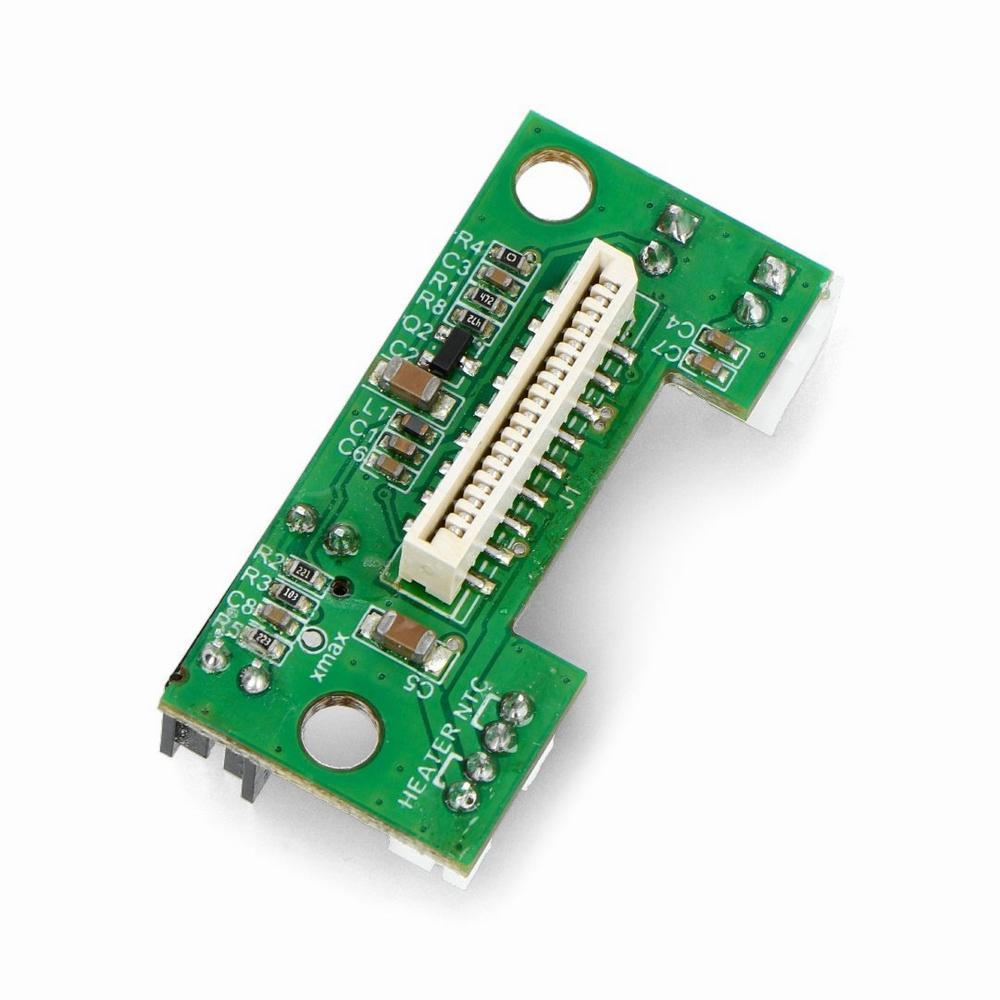 A photo of a small green circuit board with surface-mounted components.