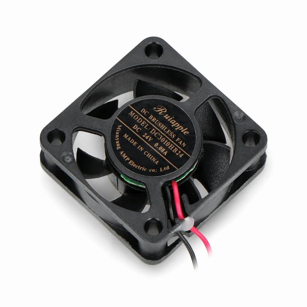 A small black square fan with a red and black wire coming out of it.