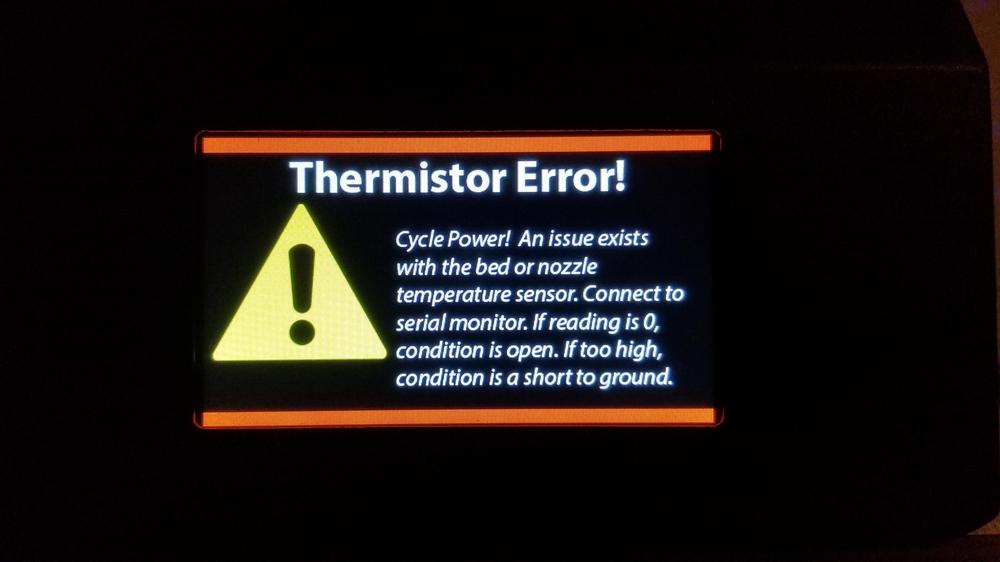 A screen is displaying a message stating there is a thermistor error, and to cycle power.