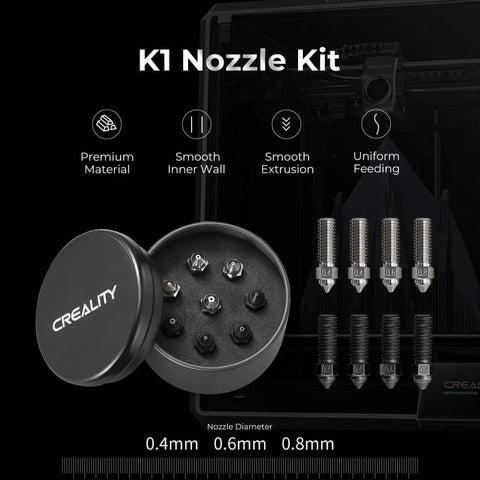 A black container with seven Creality nozzles in various sizes.