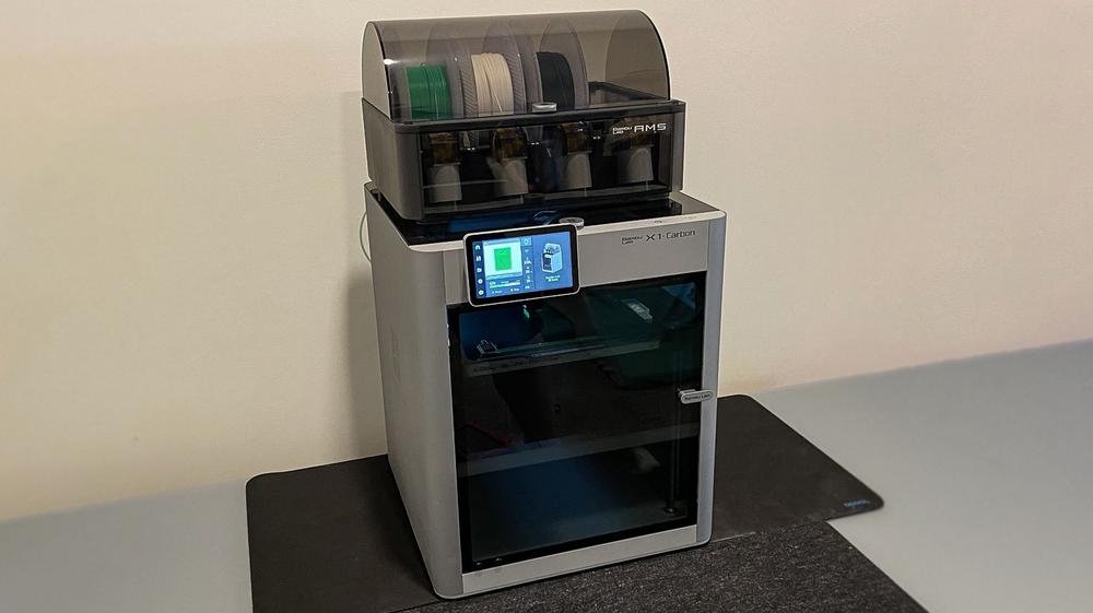A 3D printer with a large build volume and a touchscreen interface.