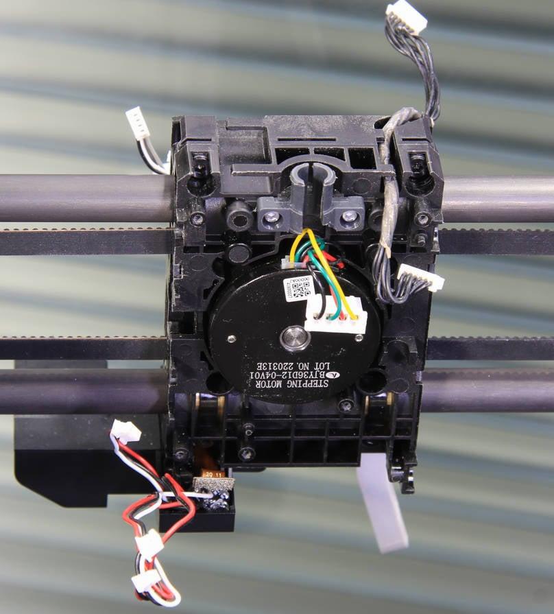 The image shows a close-up of a black gimbal with a motor in the center.