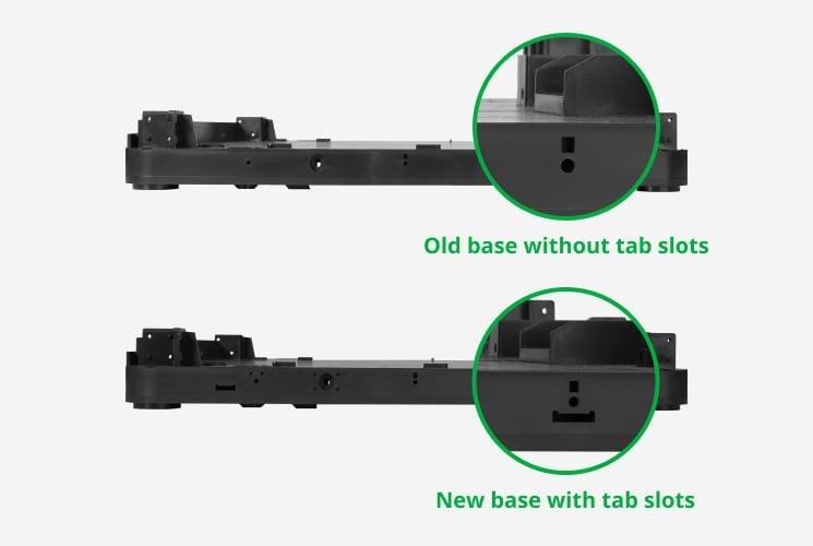 The image shows two bases, the old one on top and the new one below, with the new base having an additional tab slot.