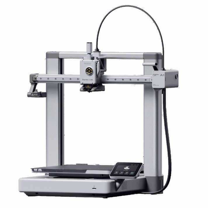 The image shows a white and gray 3D printer with a black power cord.
