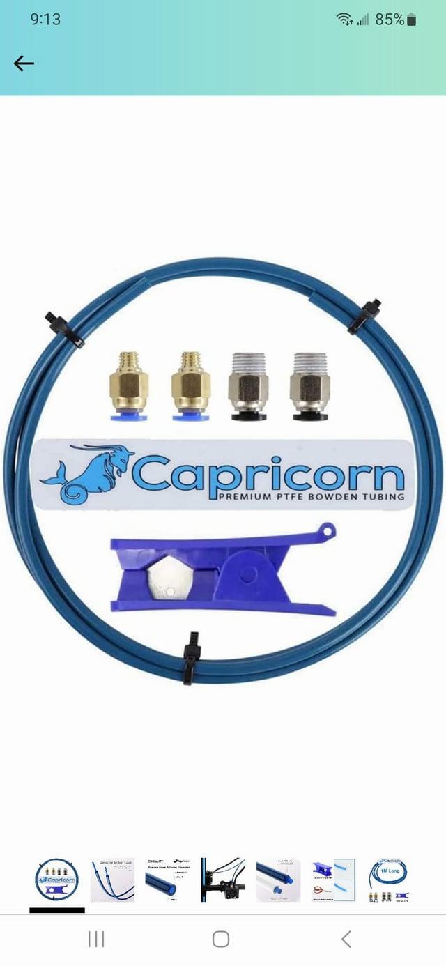 A blue Capricorn Bowden tubing with a Capricorn logo and four blue couplers.