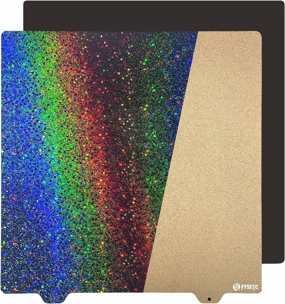 A rainbow-colored glitter sheet with a starry pattern, next to a gold glitter sheet.