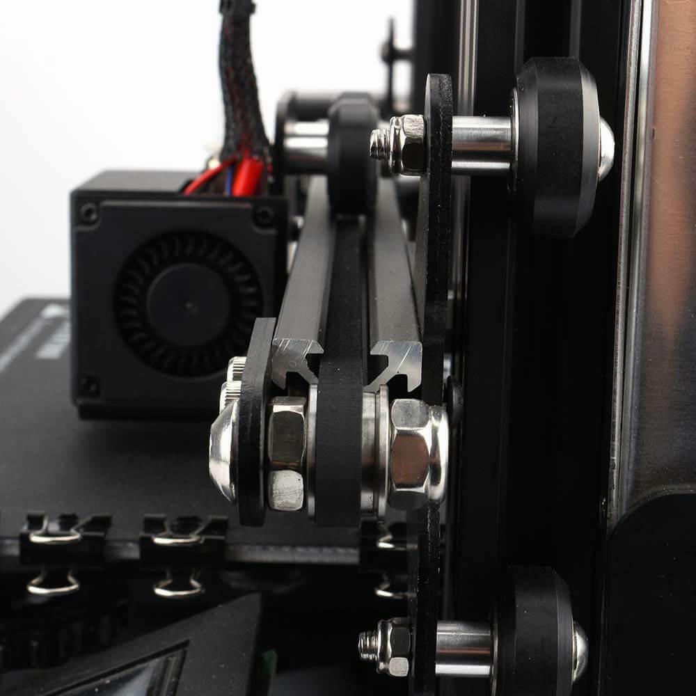 A close-up of the X-axis of a 3D printer, showing the belt, wheels, and eccentric nuts.