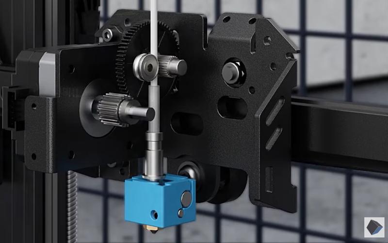A close-up of a 3D printers extruder, which is the part that melts the plastic filament and deposits it onto the build platform.