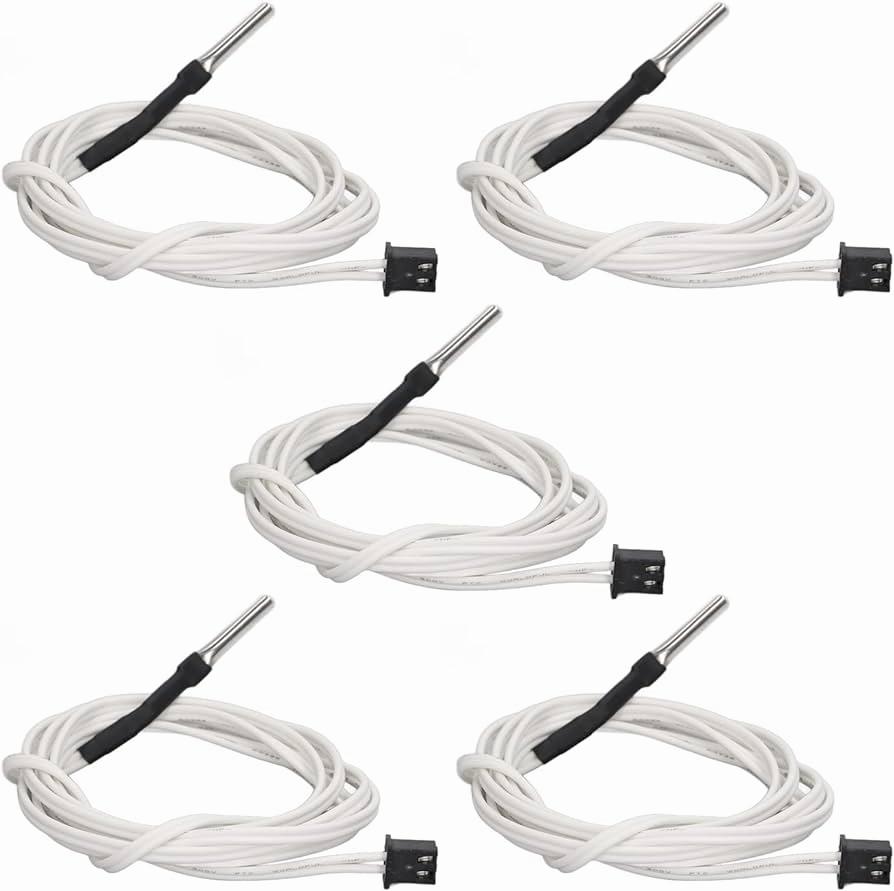 Five white temperature sensor cables with black tips.