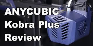 A close up of the blue Anycubic Kobra Plus 3D printer with a review text overlay.